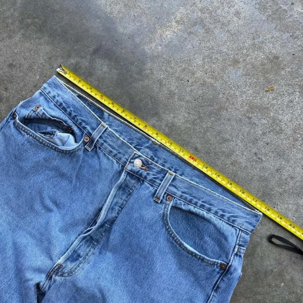 Vintage 90s Levi's 501s made in USA button fly jeans size 36x29